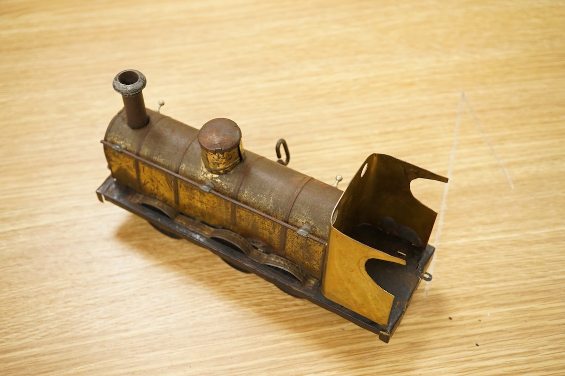 Seven Gauge One coarse scale railway freight wagons, by Bassett-Lowke, etc., including tinplate and wooden examples in liveries for LNWR, Midland Railway, and LBSCR, together with the remains of a scarce late 19th centur